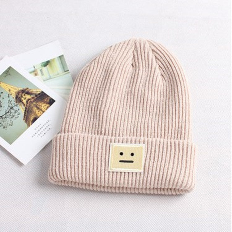 Smiley lady in knitted hat