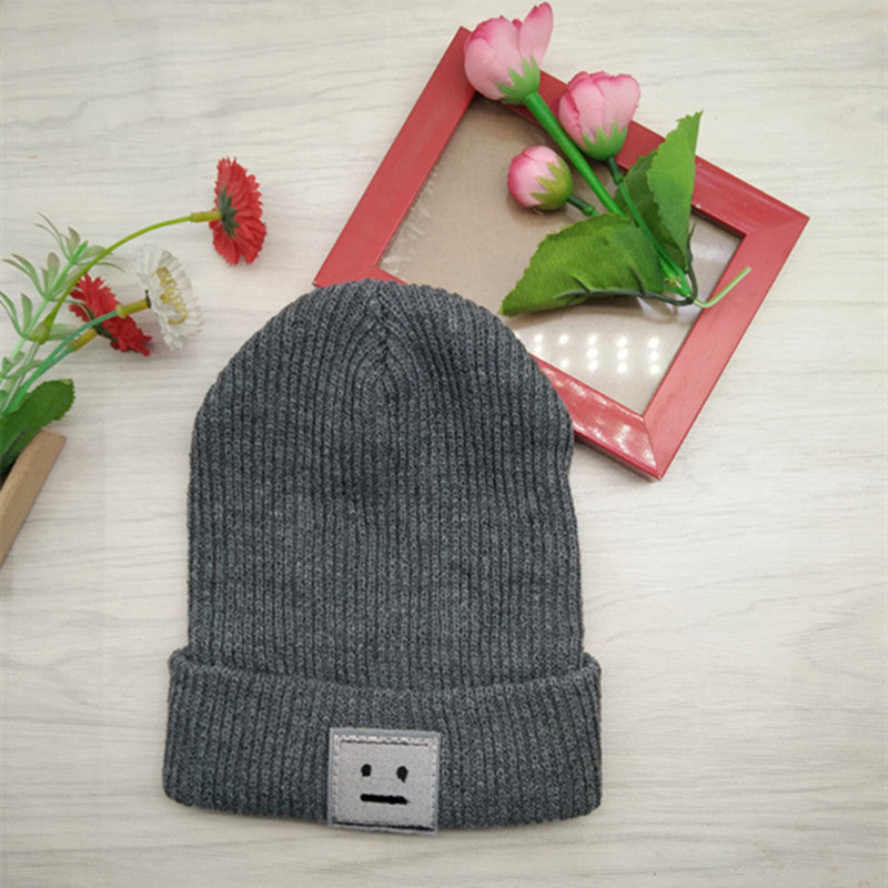 Smiley lady in knitted hat