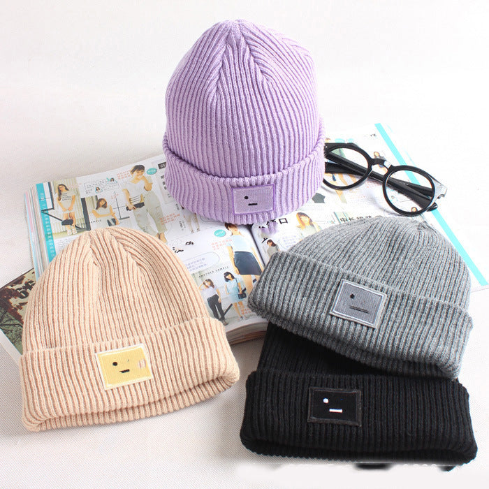 Smiley lady in knitted hat