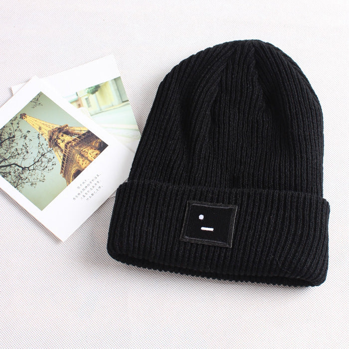 Smiley lady in knitted hat