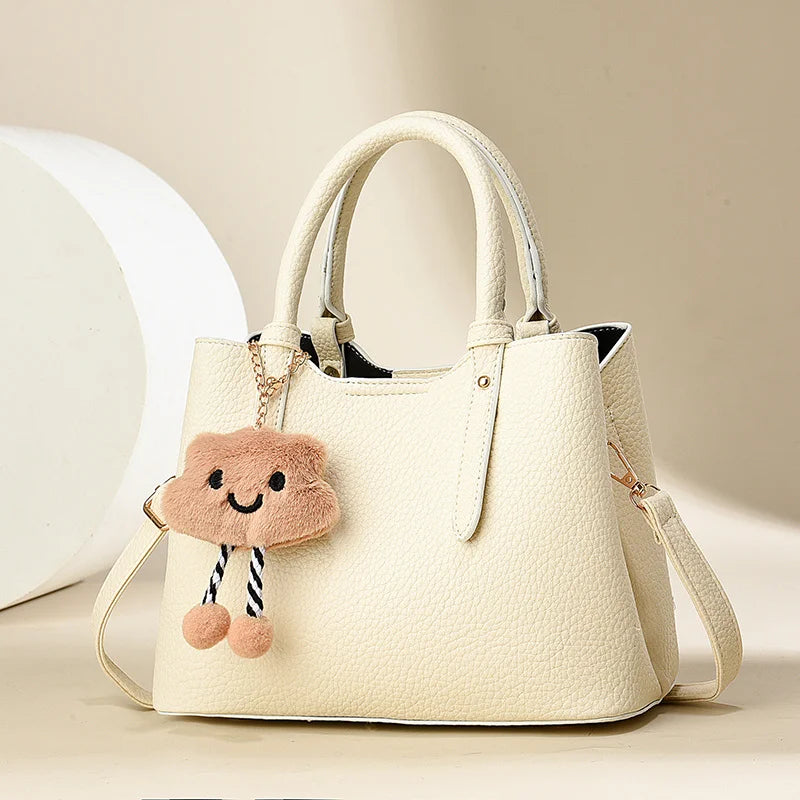 Women's Fashion Cross-Body Handbag Cute Cartoon Pendant Solid Color Zipper Closure Wholesale from Factory