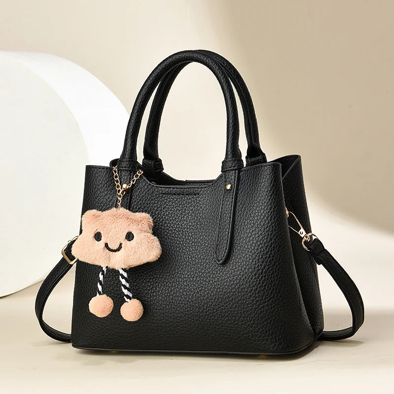 Women's Fashion Cross-Body Handbag Cute Cartoon Pendant Solid Color Zipper Closure Wholesale from Factory