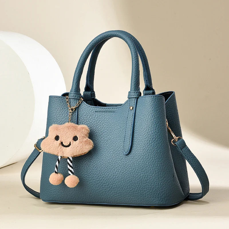 Women's Fashion Cross-Body Handbag Cute Cartoon Pendant Solid Color Zipper Closure Wholesale from Factory