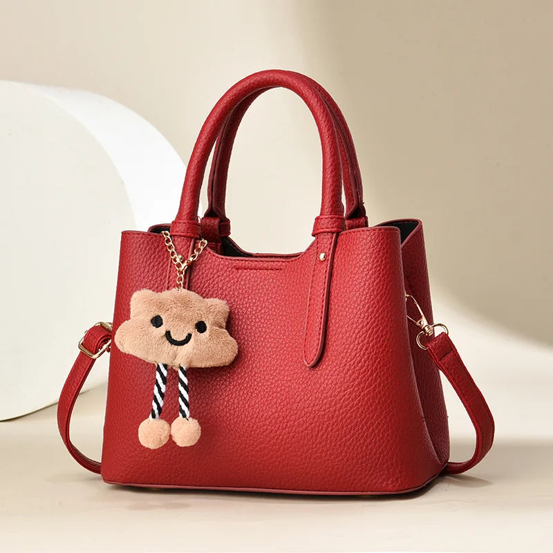Women's Fashion Cross-Body Handbag Cute Cartoon Pendant Solid Color Zipper Closure Wholesale from Factory