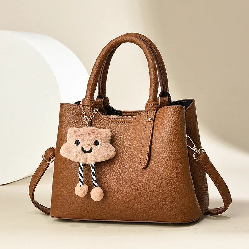 Women's Fashion Cross-Body Handbag Cute Cartoon Pendant Solid Color Zipper Closure Wholesale from Factory