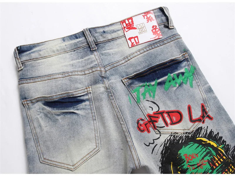 Herren Bedruckte Stretch-Jeans Streetwear Charakter Totenkopf Flamme Bemalte Hose Vintage Knöpfe Fly Schlanke zerrissene Hose