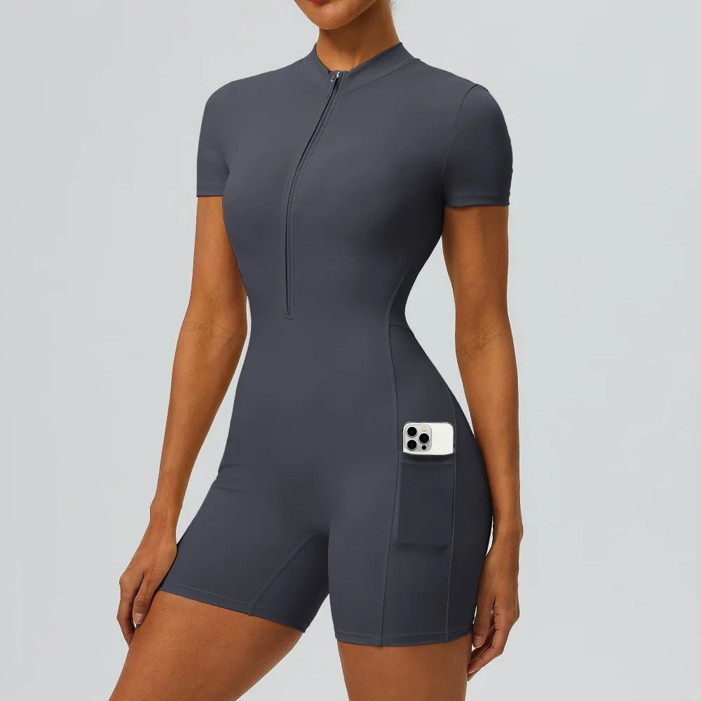 Women's zipper short sleeved yoga jumpsuit with functional pockets for hip lifting and tight fitting sports jumpsuit shorts