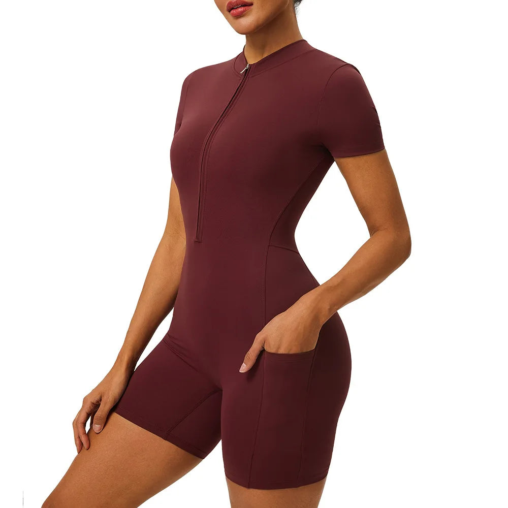 Women's zipper short sleeved yoga jumpsuit with functional pockets for hip lifting and tight fitting sports jumpsuit shorts