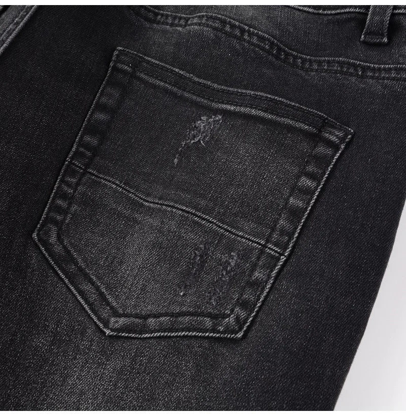 Men Cracked Leather Patch Biker Jeans Streetwear Pleated Patchwork Holes Ripped Stretch Denim Pants Skinny Tapered Trousers