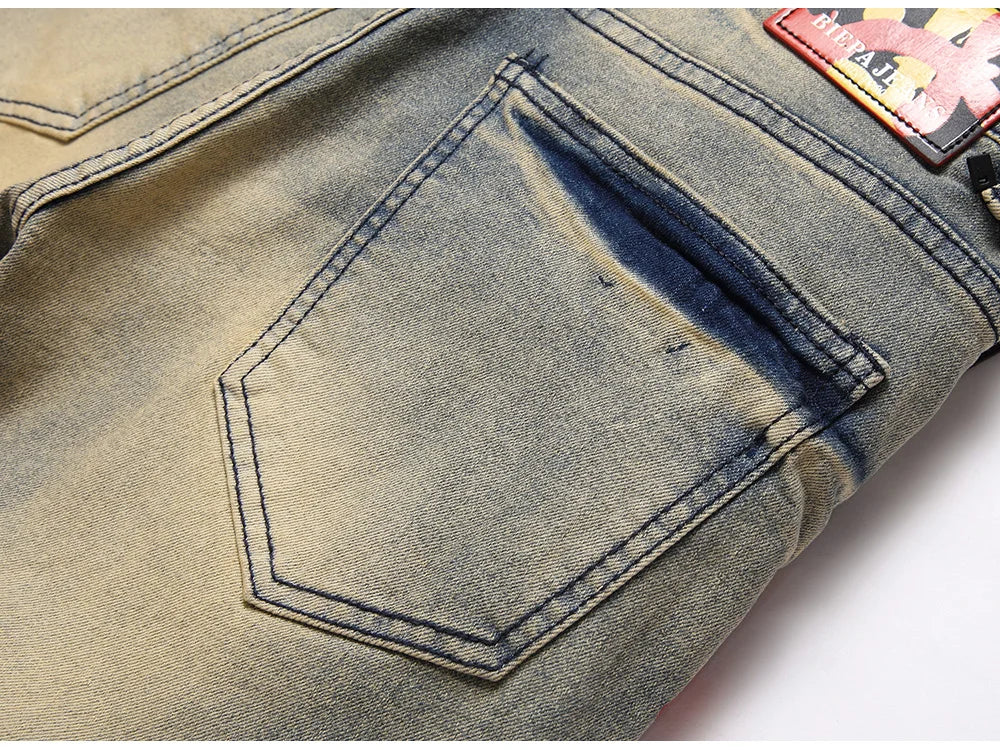 Herren Bedruckte Stretch-Jeans Streetwear Charakter Totenkopf Flamme Bemalte Hose Vintage Knöpfe Fly Schlanke zerrissene Hose