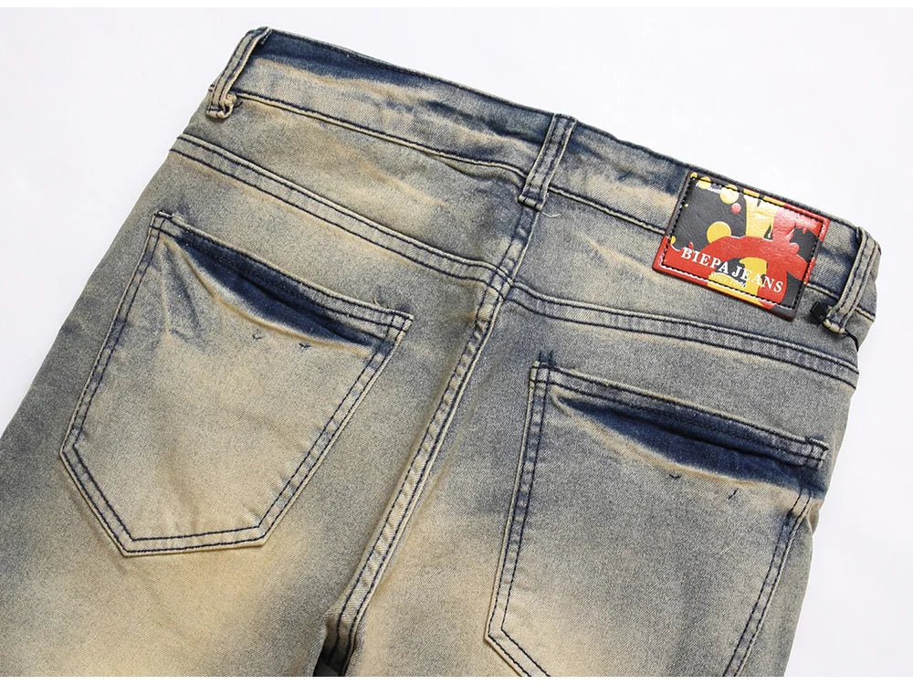 Herren Bedruckte Stretch-Jeans Streetwear Charakter Totenkopf Flamme Bemalte Hose Vintage Knöpfe Fly Schlanke zerrissene Hose