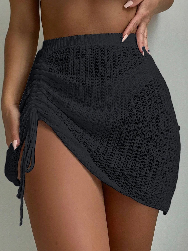 Fashionable and elegant short skirt pool party with hollowed out drawstring bikini knit short skirt summer beach