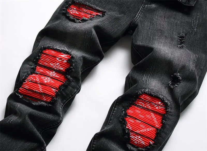 Modische neue Bikerjeans