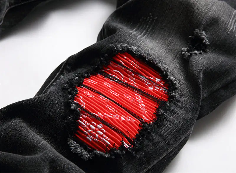 Modische neue Bikerjeans